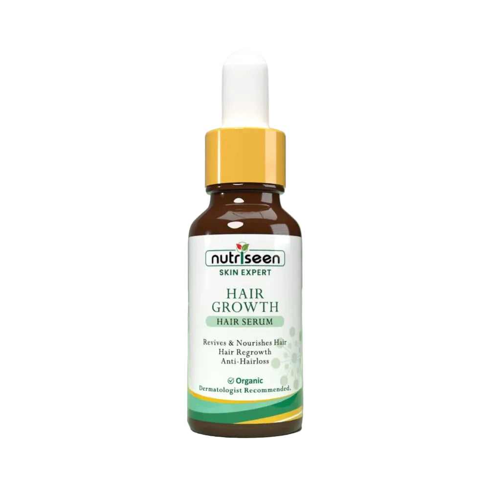 Hair growth serum bottle with dropper on a green background